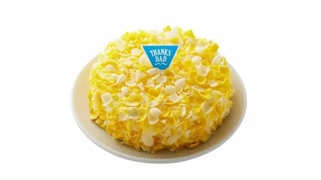 黄色と白のチョコレートで包まれた、花束のような父の日限定ケーキ「グルノーブル」正面写真(モロゾフ)